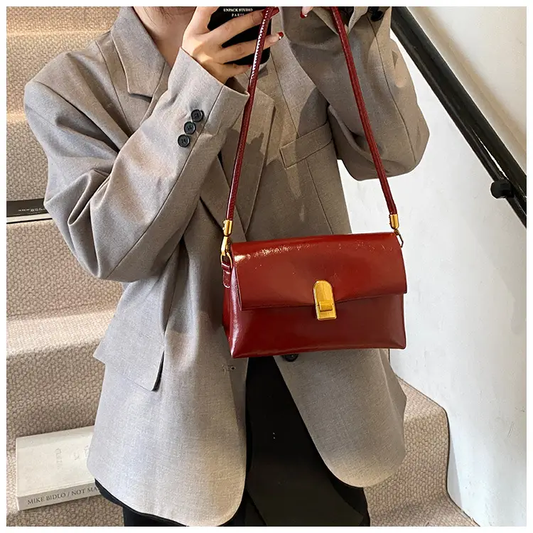 Women's Brown Leather Shoulder Bag with Gold Clasp — feature 23