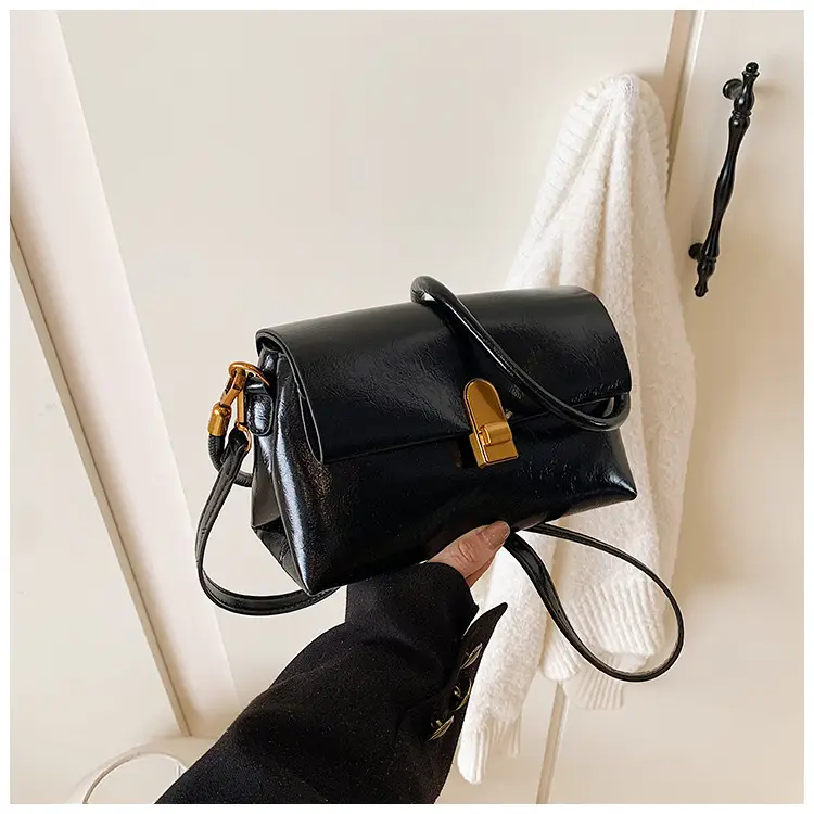 Women's Brown Leather Shoulder Bag with Gold Clasp — feature 24