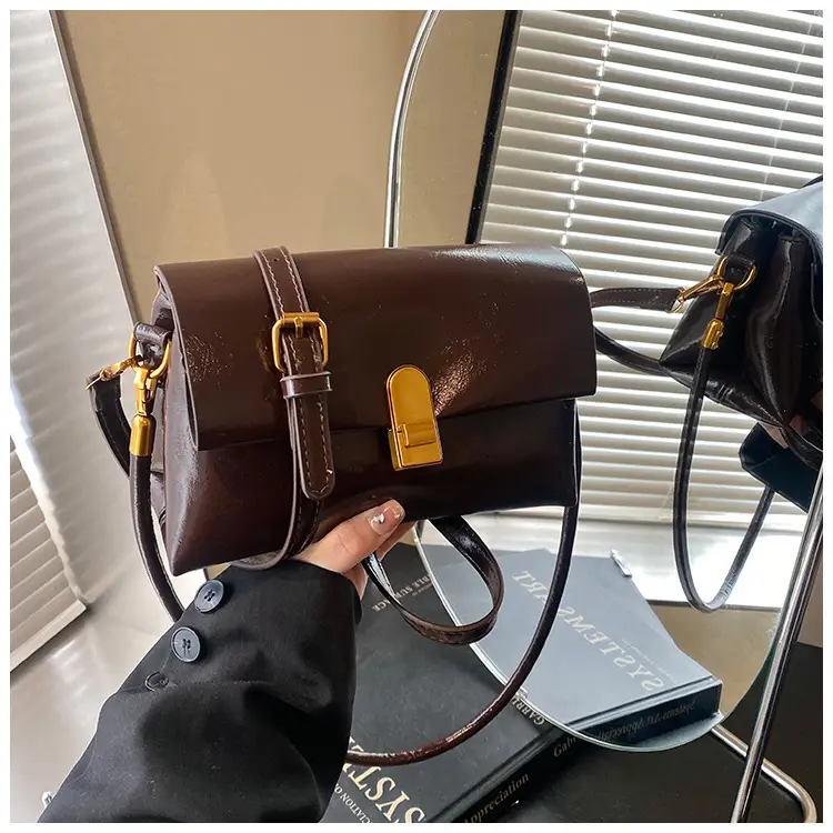 Women's Brown Leather Shoulder Bag with Gold Clasp — feature 27