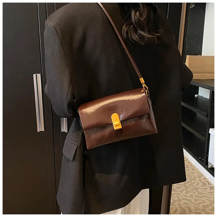Women's Brown Leather Shoulder Bag with Gold Clasp — feature 9