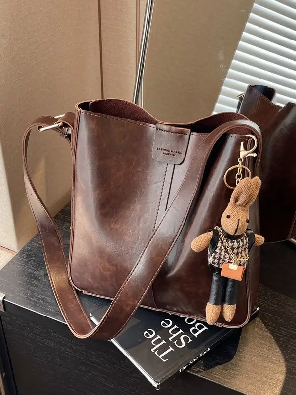 Women's Brown Leather Shoulder Bag with Cute Toy Charm - Image 10