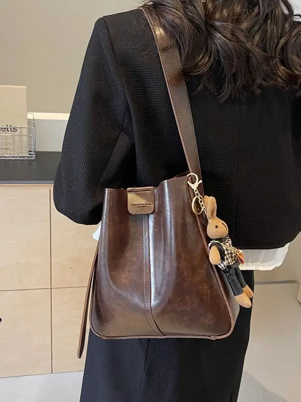 Women's Brown Leather Shoulder Bag with Cute Toy Charm - Image 11