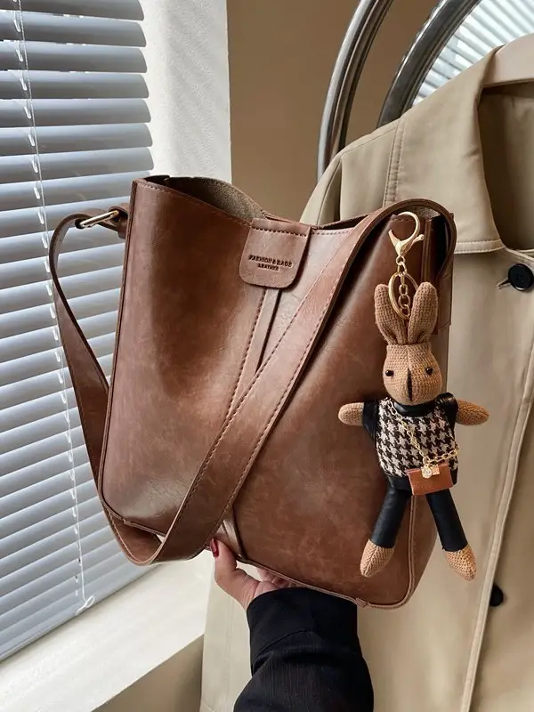 Women's Brown Leather Shoulder Bag with Cute Toy Charm - Image 12