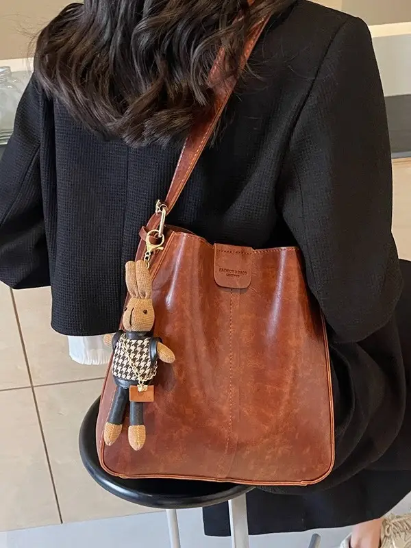 Women's Brown Leather Shoulder Bag with Cute Toy Charm - Image 13
