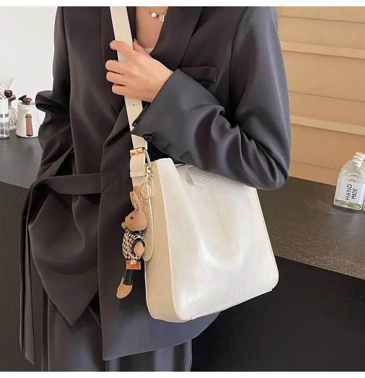 Women's Brown Leather Shoulder Bag with Cute Toy Charm — feature 10