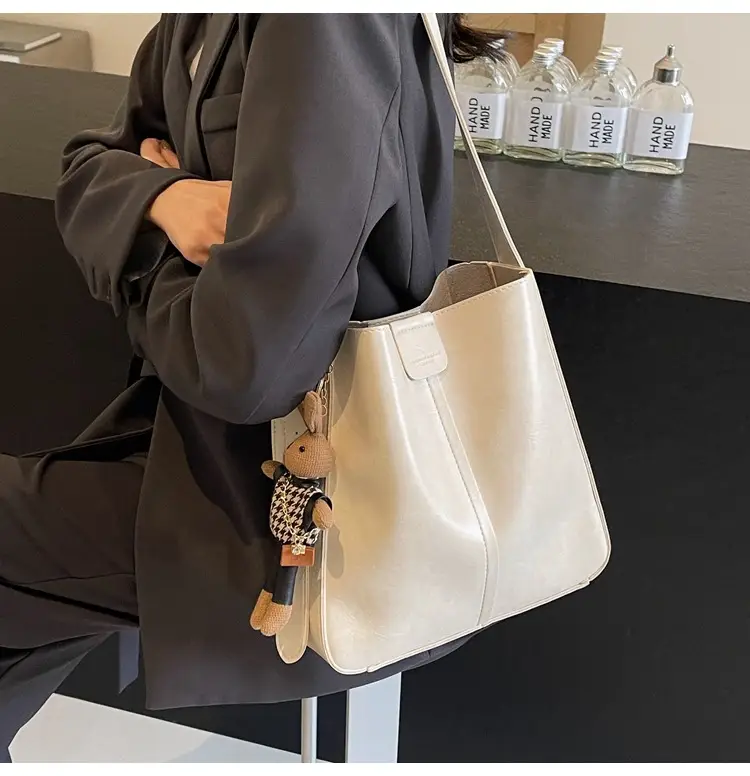 Women's Brown Leather Shoulder Bag with Cute Toy Charm — feature 11