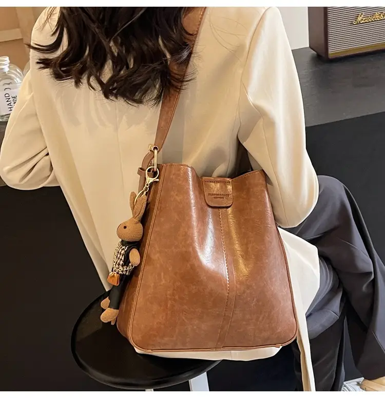 Women's Brown Leather Shoulder Bag with Cute Toy Charm — feature 14