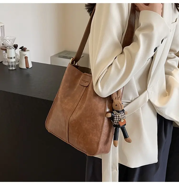 Women's Brown Leather Shoulder Bag with Cute Toy Charm — feature 15