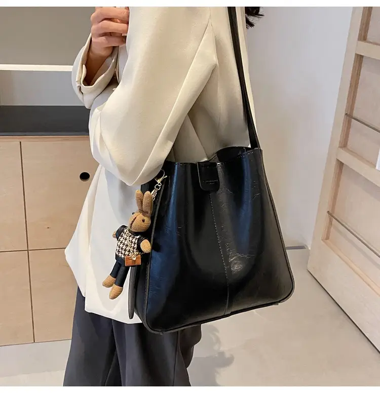 Women's Brown Leather Shoulder Bag with Cute Toy Charm — feature 17