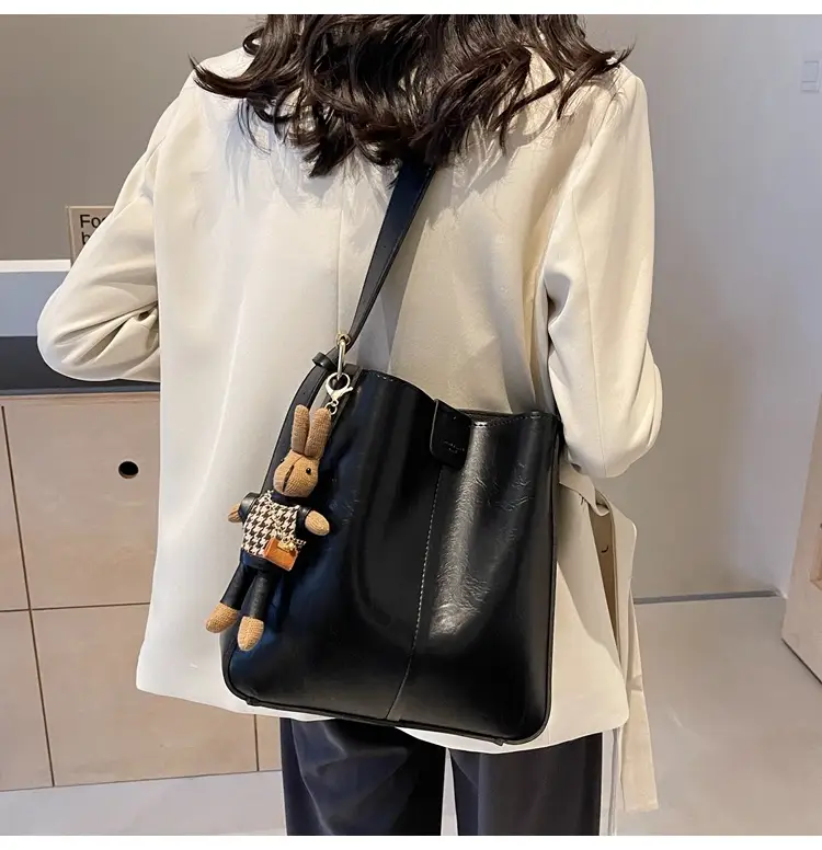 Women's Brown Leather Shoulder Bag with Cute Toy Charm — feature 18