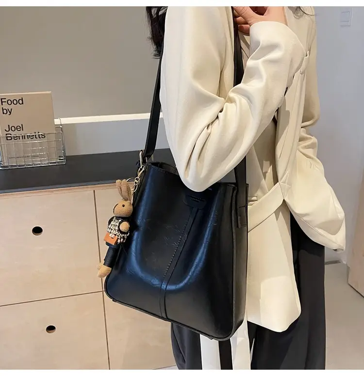 Women's Brown Leather Shoulder Bag with Cute Toy Charm — feature 19