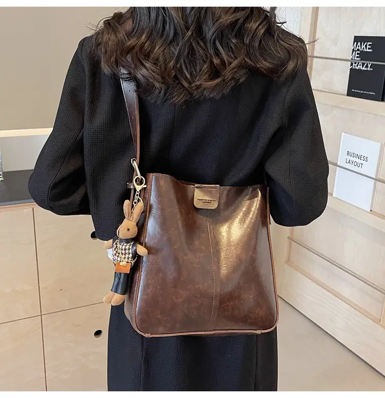 Women's Brown Leather Shoulder Bag with Cute Toy Charm — feature 20