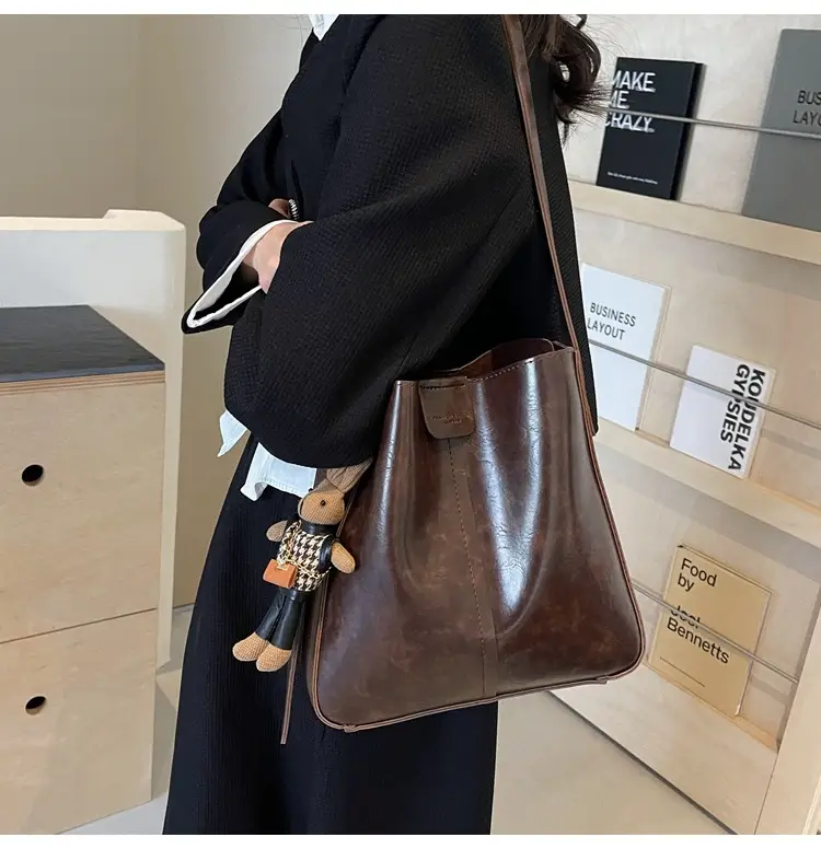 Women's Brown Leather Shoulder Bag with Cute Toy Charm — feature 21