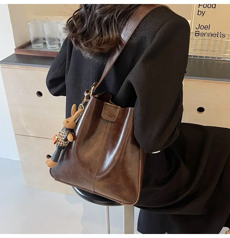 Women's Brown Leather Shoulder Bag with Cute Toy Charm — feature 22