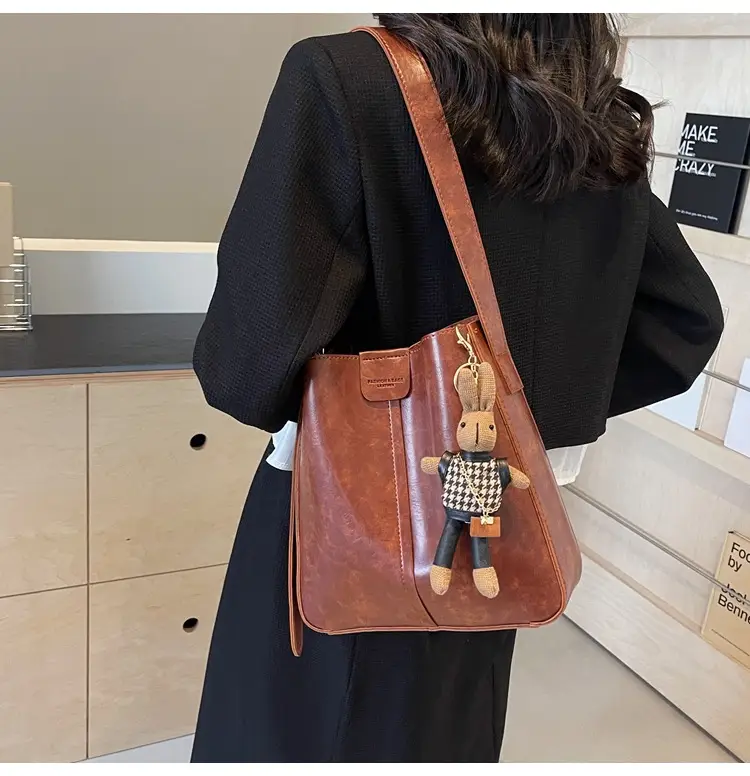 Women's Brown Leather Shoulder Bag with Cute Toy Charm — feature 25