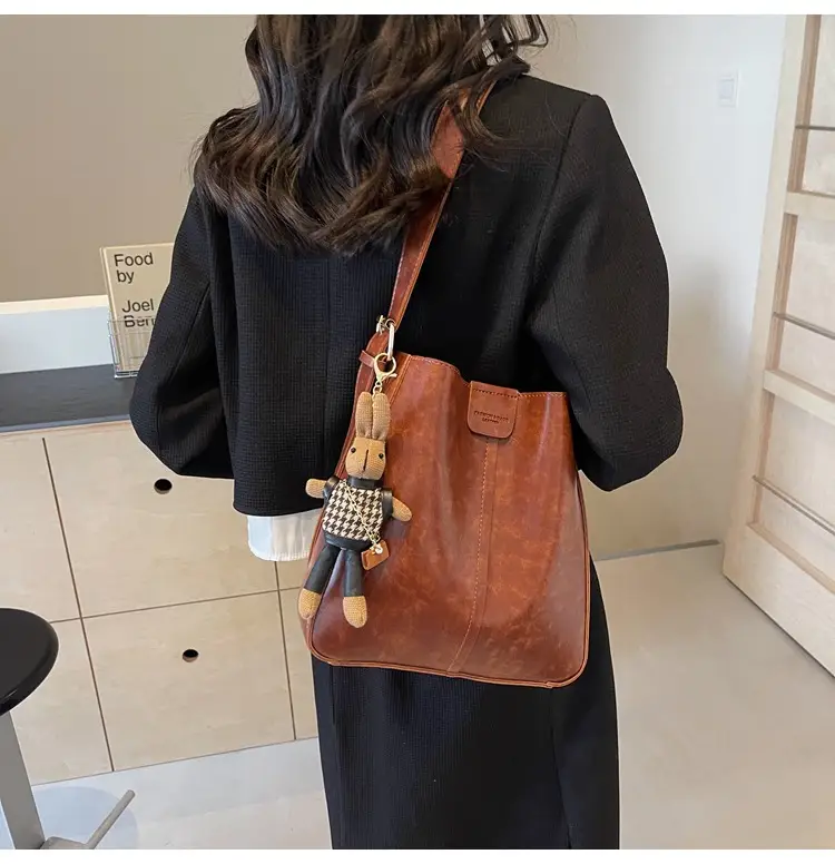 Women's Brown Leather Shoulder Bag with Cute Toy Charm — feature 26
