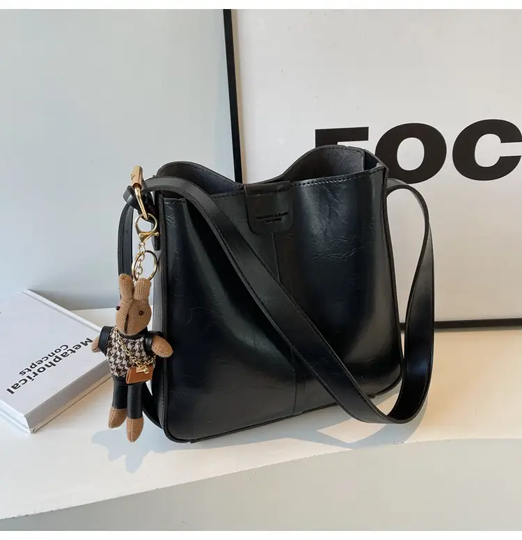 Women's Brown Leather Shoulder Bag with Cute Toy Charm — feature 28