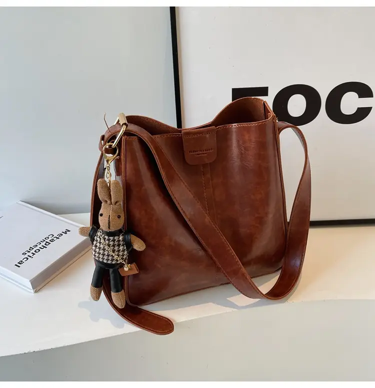 Women's Brown Leather Shoulder Bag with Cute Toy Charm — feature 31