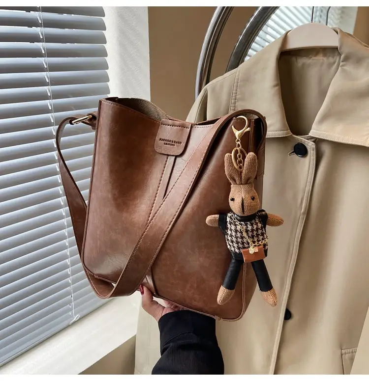 Women's Brown Leather Shoulder Bag with Cute Toy Charm — feature 35