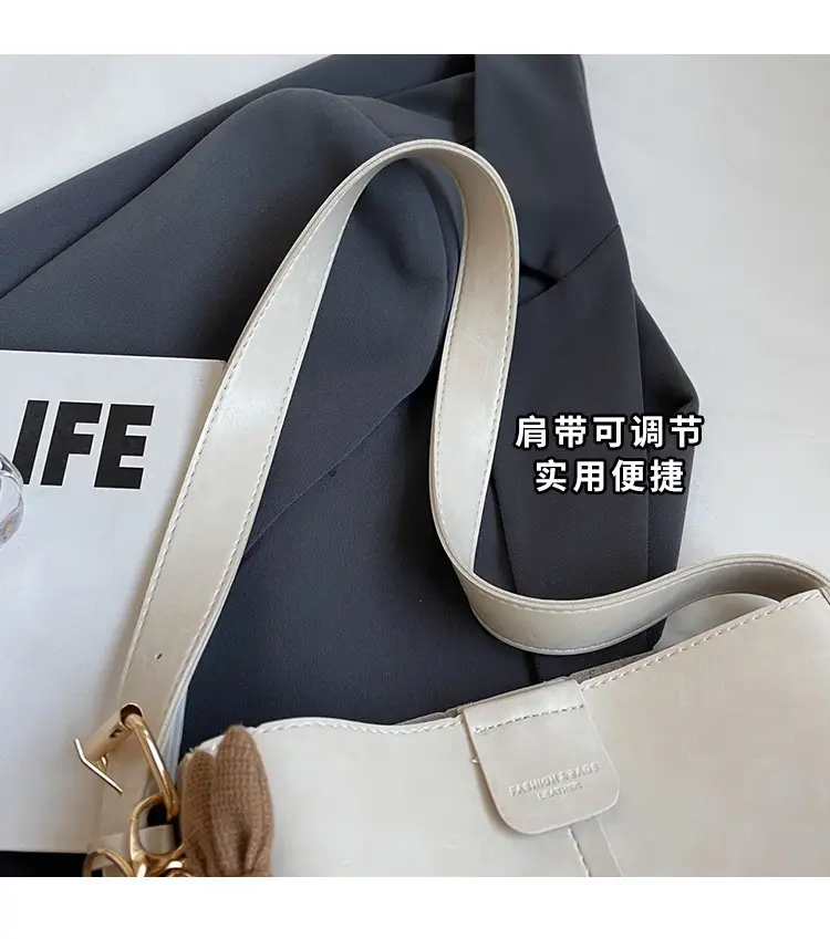 Women's Brown Leather Shoulder Bag with Cute Toy Charm — feature 4