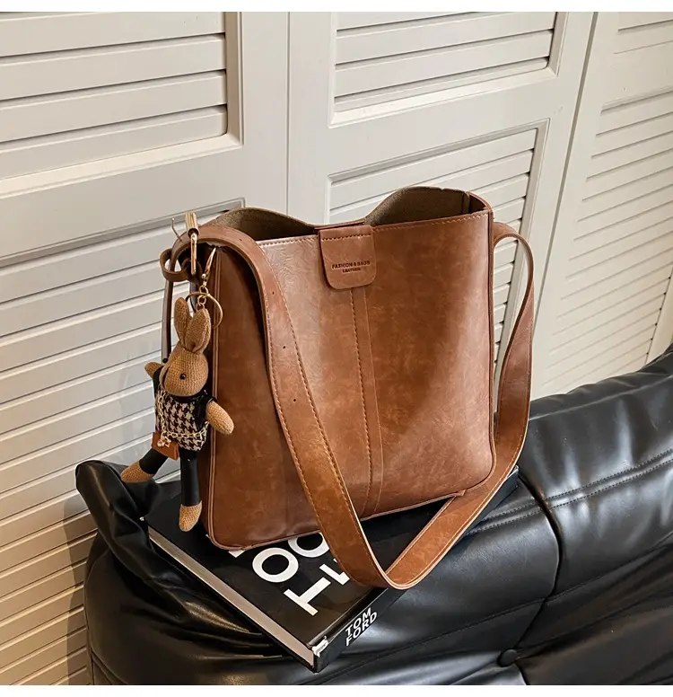 Women's Brown Leather Shoulder Bag with Cute Toy Charm — feature 40