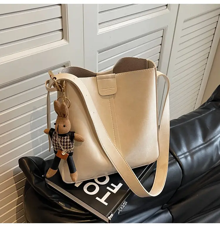 Women's Brown Leather Shoulder Bag with Cute Toy Charm — feature 42