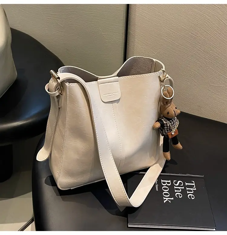 Women's Brown Leather Shoulder Bag with Cute Toy Charm — feature 46