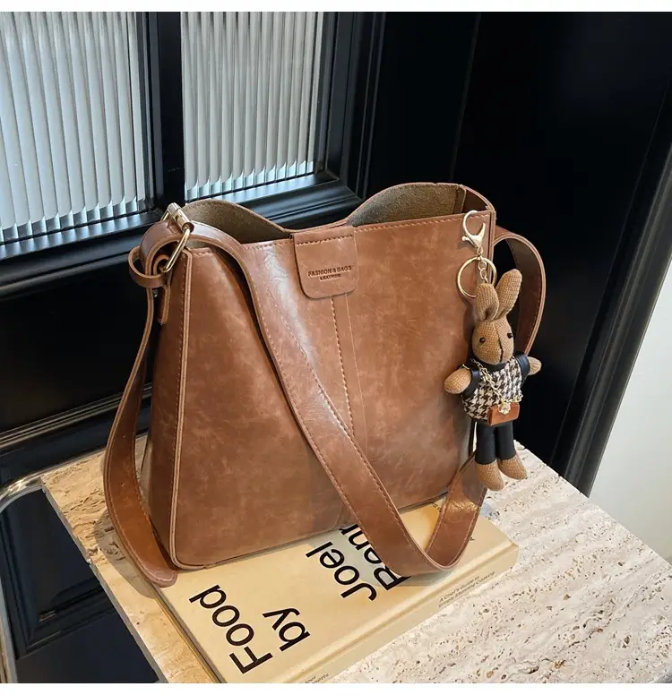 Women's Brown Leather Shoulder Bag with Cute Toy Charm — feature 48