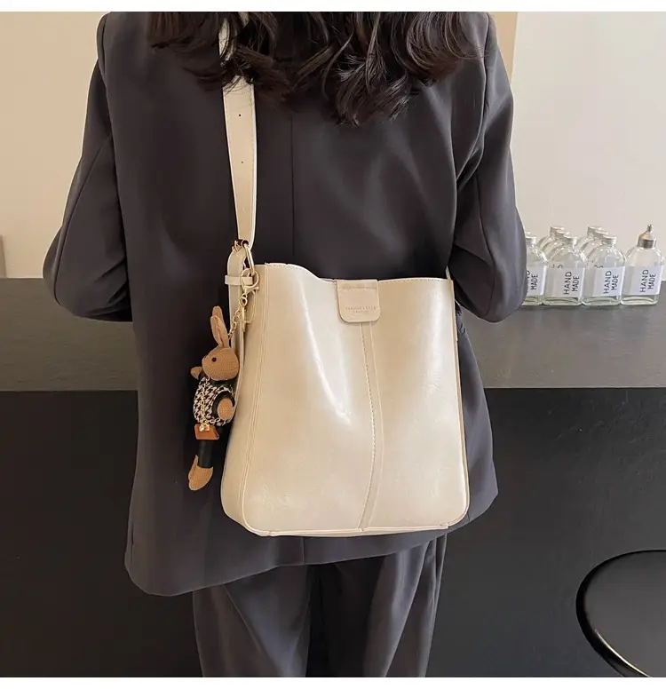 Women's Brown Leather Shoulder Bag with Cute Toy Charm — feature 9
