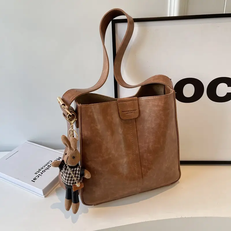 Women's Brown Leather Shoulder Bag with Cute Toy Charm - Image 5