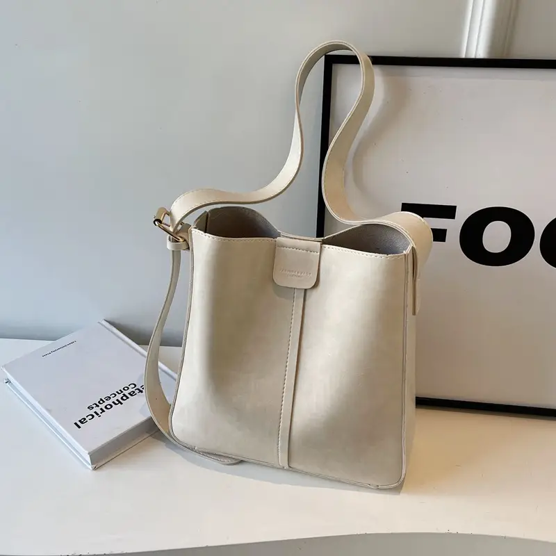 Women's Brown Leather Shoulder Bag with Cute Toy Charm - Image 7