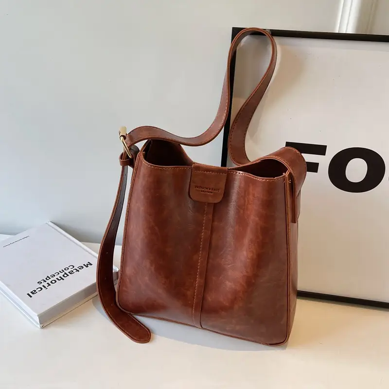 Women's Brown Leather Shoulder Bag with Cute Toy Charm - Image 8