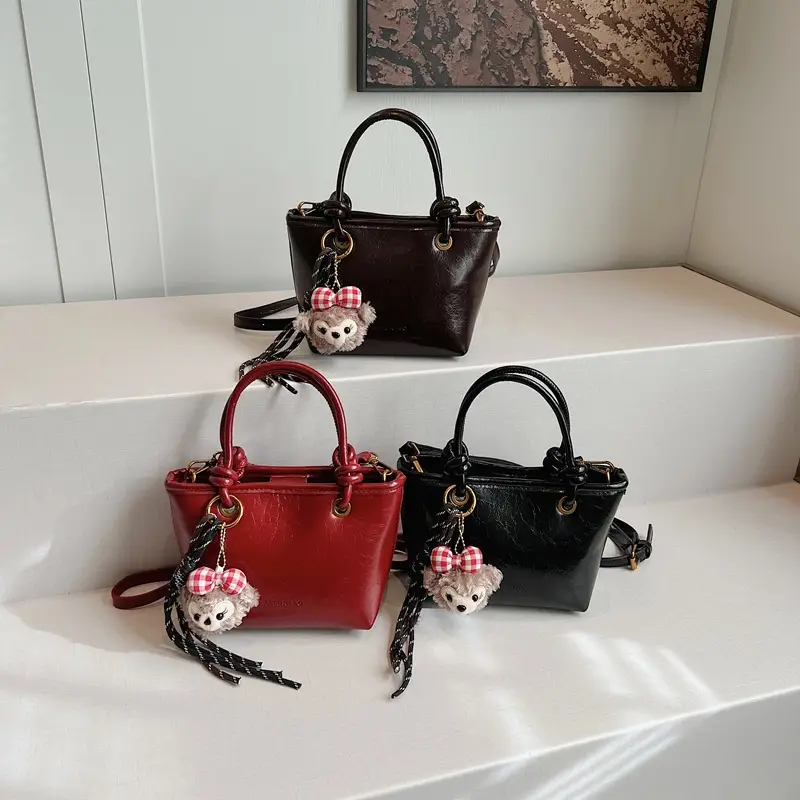 Red Crossbody Bag for Women with Doll Charm - Image 5