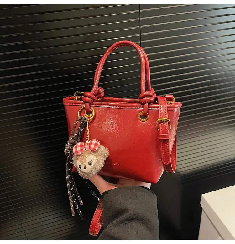 Red Crossbody Bag for Women with Doll Charm — feature 9
