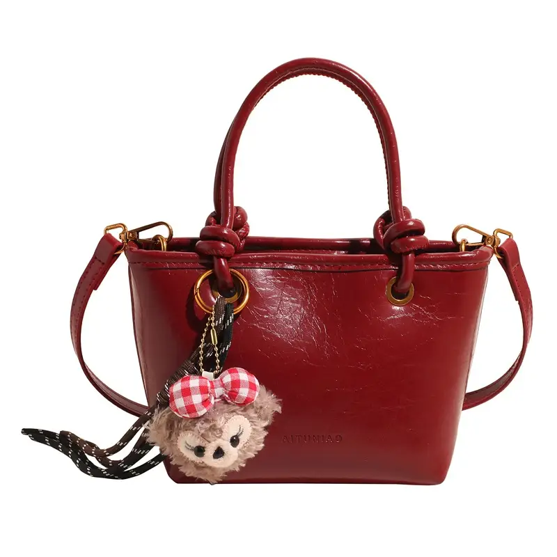 Red Crossbody Bag for Women with Doll Charm - Image 3
