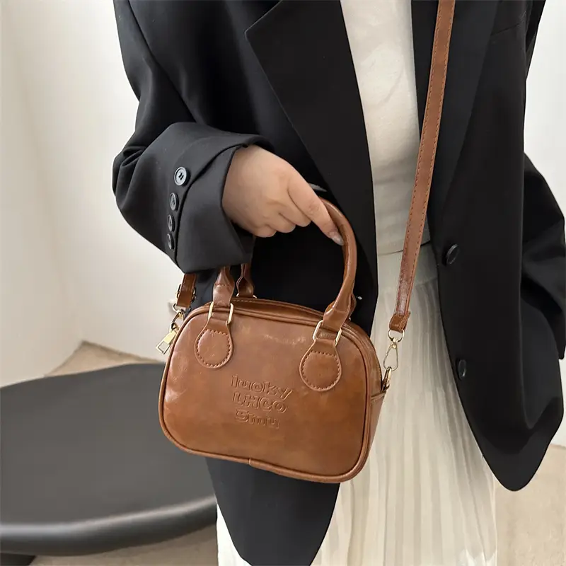 Vintage Brown Handbag with Pendant for Women - Image 10
