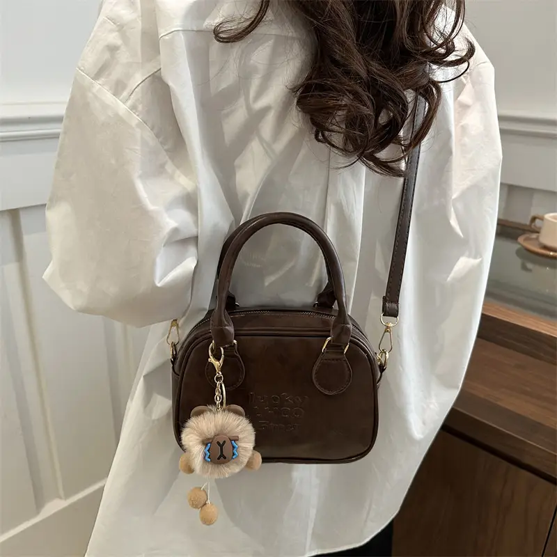 Vintage Women's Brown Shoulder Crossbody Bag with Pom Pom Charm - Image 7