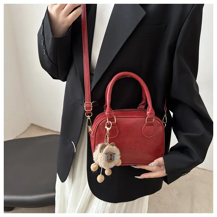 Vintage Women's Brown Shoulder Crossbody Bag with Pom Pom Charm — feature 11