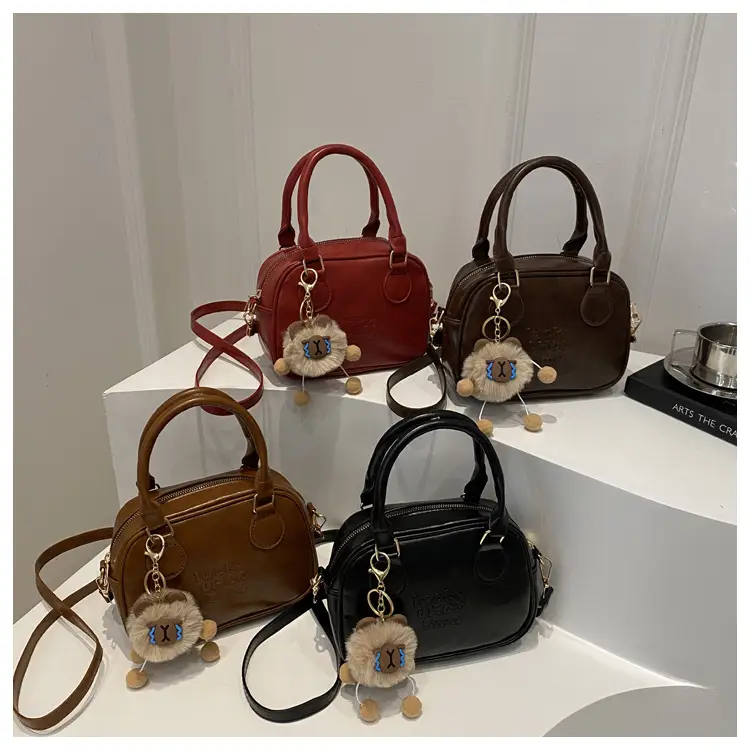 Vintage Women's Brown Shoulder Crossbody Bag with Pom Pom Charm — feature 21
