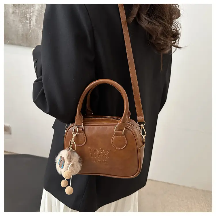 Vintage Women's Brown Shoulder Crossbody Bag with Pom Pom Charm — feature 9
