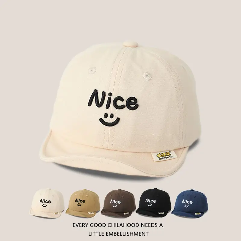 Brown Embroidered Baby Cap with Smile Design