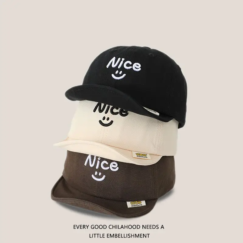 Brown Embroidered Baby Cap with Smile Design