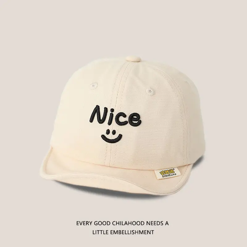 Brown Embroidered Baby Cap with Smile Design