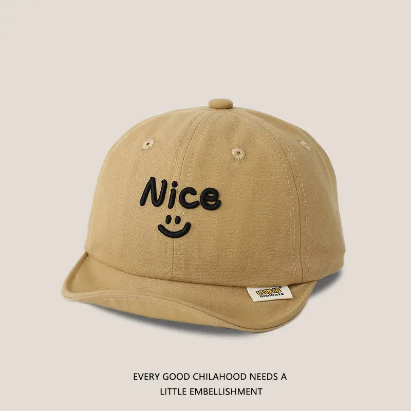 Brown Embroidered Baby Cap with Smile Design