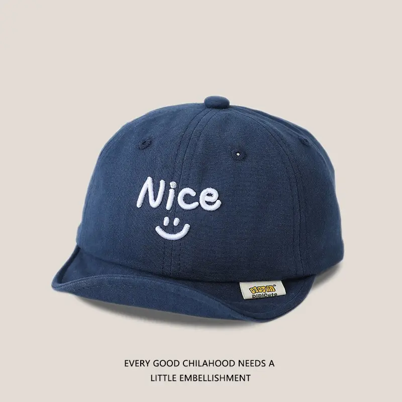 Brown Embroidered Baby Cap with Smile Design