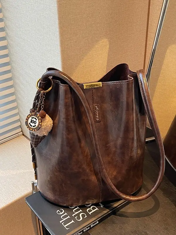 Vintage Brown Leather Bucket Bag with Chain Strap - Image 2