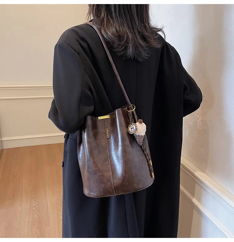 Vintage Brown Leather Bucket Bag with Chain Strap — feature 11