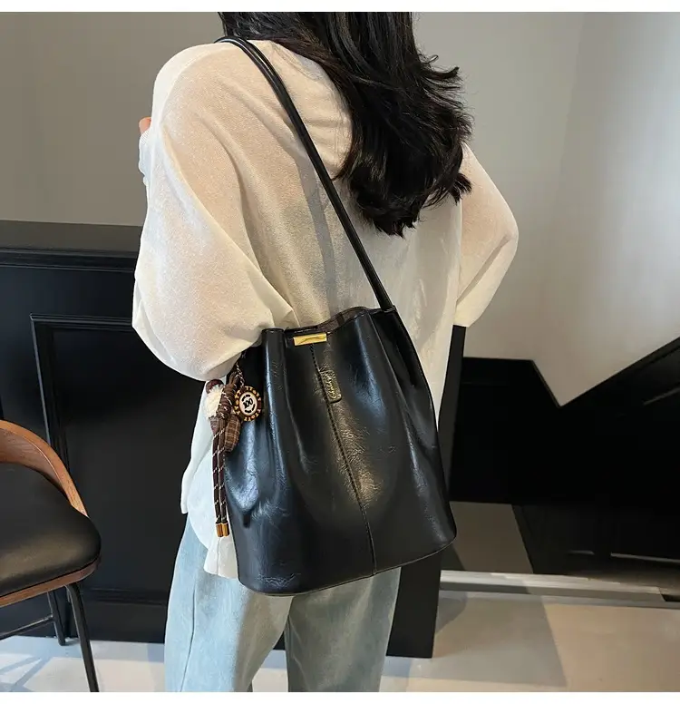 Vintage Brown Leather Bucket Bag with Chain Strap — feature 13