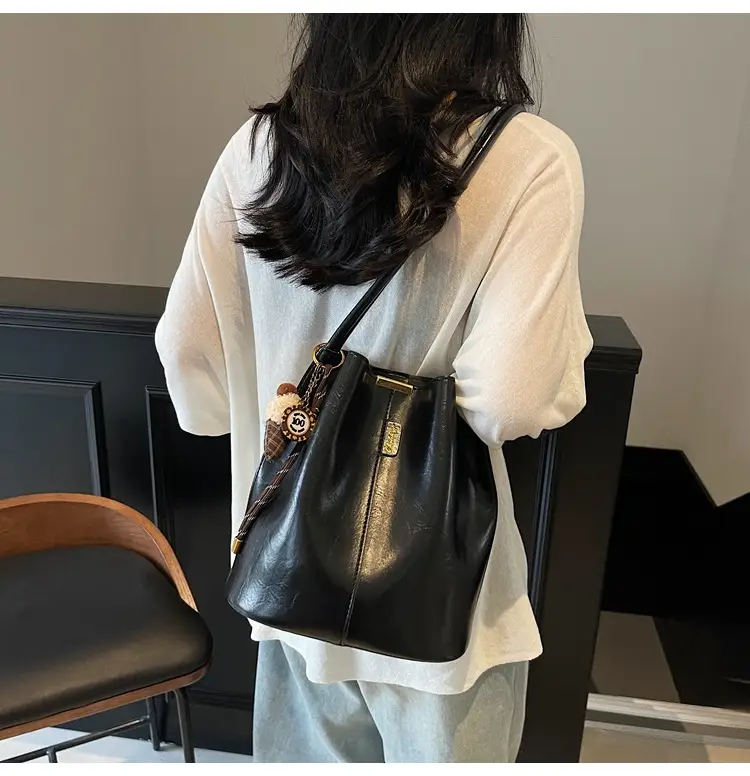 Vintage Brown Leather Bucket Bag with Chain Strap — feature 14