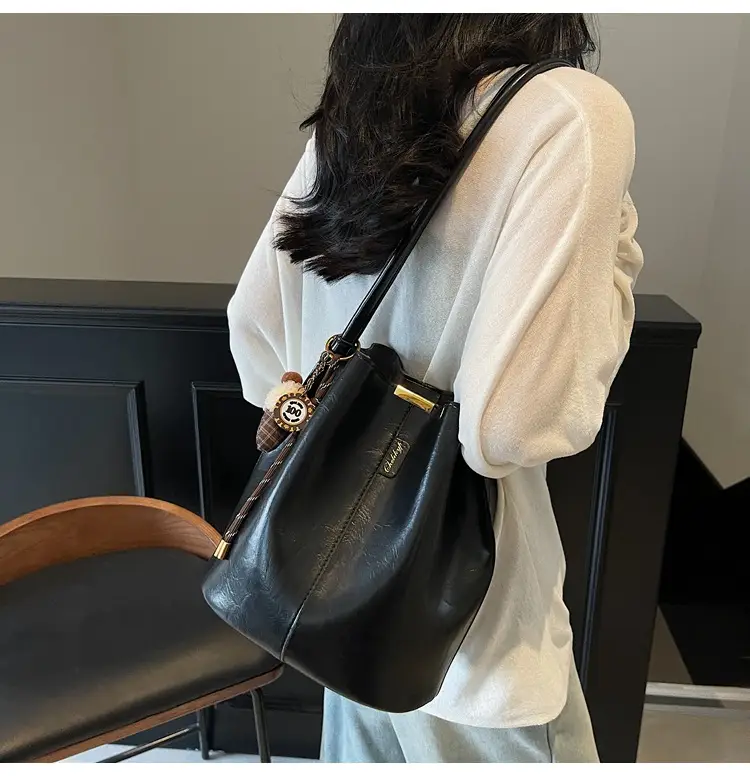 Vintage Brown Leather Bucket Bag with Chain Strap — feature 15